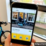 Home 23 전자상거래 플랫폼에서의 UX 디자인 원칙 - Photorealistic Dutch shopper using a smartphone to browse an ecommerce app at a bright Amsterdam can...